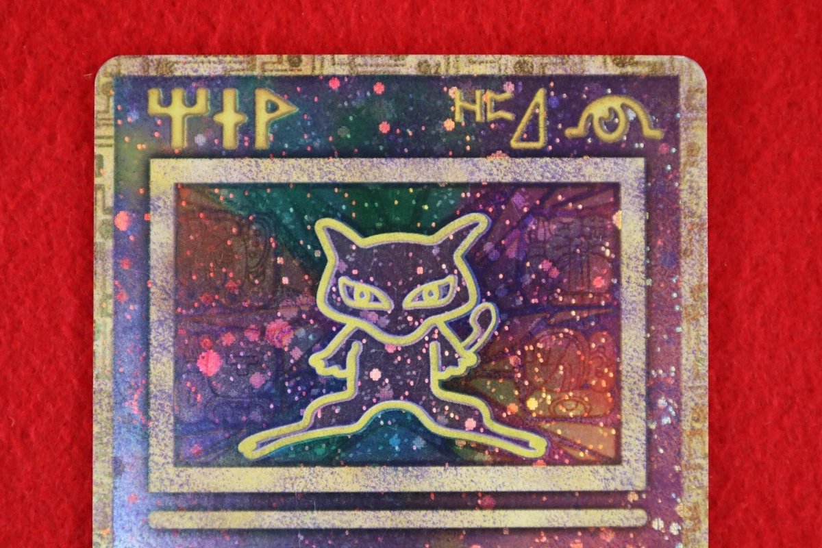 A rare Ancient Mew Pokémon card in perfect condition, typo and all