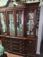 Antique 1986 Kensington 2 piece china cabinet. Trying to buy family christmas 