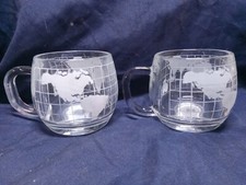 Set of 2  Vintage Nestle Co. World Globe~ Clear Etched Glass Coffee Mugs/ Cups