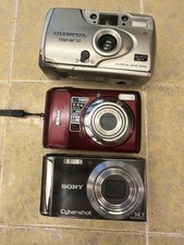 Nikon Coolpix S4100 digital camera/Sony Cyber Shot/ Olympus Trip AF 50! READ DIS