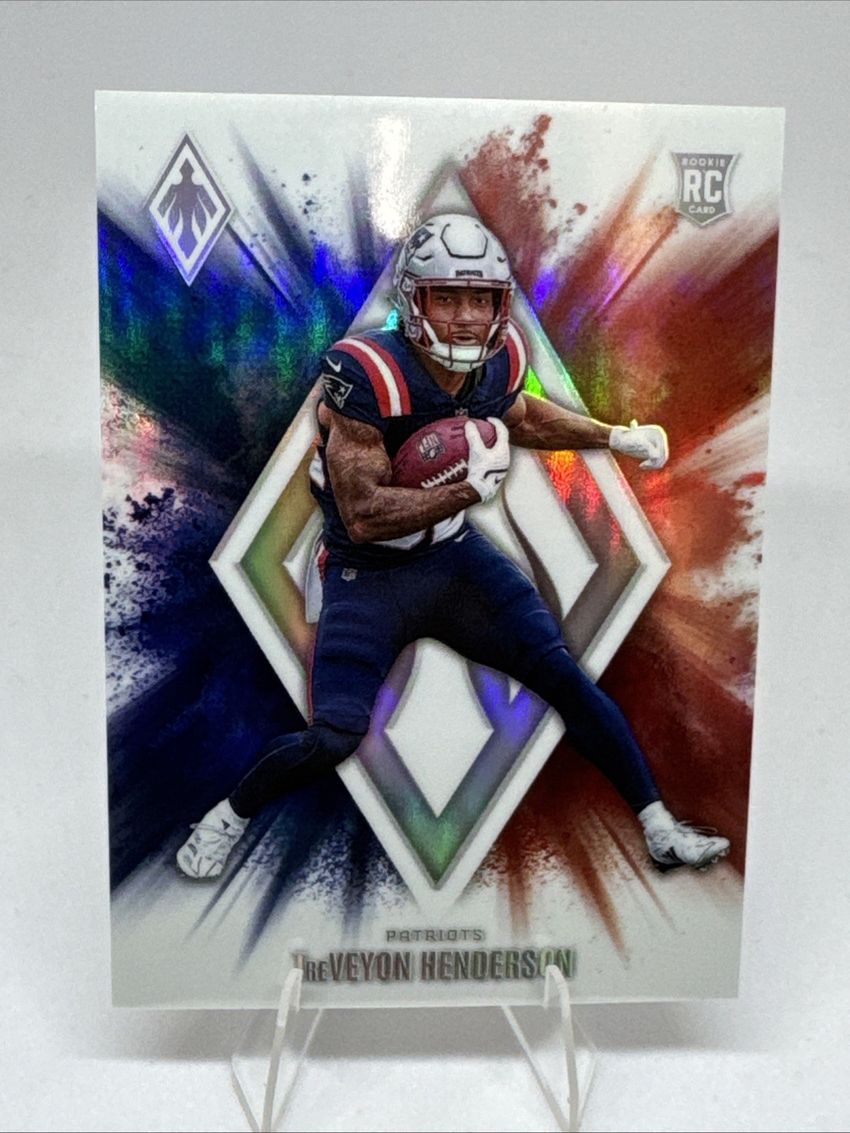 TREVEYON HENDERSON  2025 Panini Phoenix Color Blast Case Hit SSP #10 RC PATRIOTS