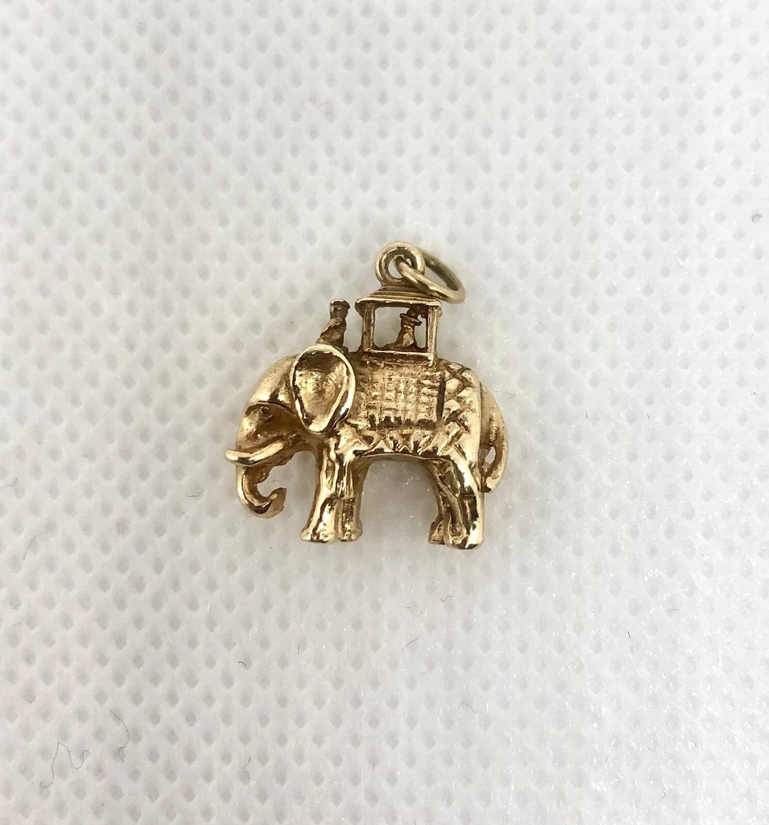Solid gold elephant sale