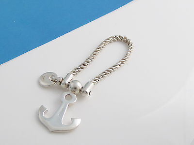 Tiffany & Co.® shopping bag charm in sterling silver with enamel finish. |  Tiffany & Co.
