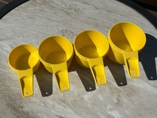 Vtg Tupperware Set of 4 Yellow Measuring Cups 1/3 Cup to 1 Cup Nesting Retro