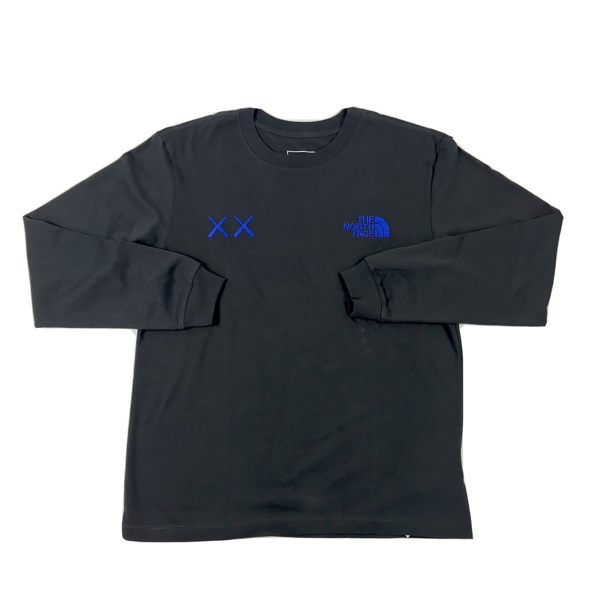 KAWS x THE NORTH FACE x LOGO BLUE EMBROIDERED LS GREY T KAWS x THE NORTH FACE x LOGO BLUE EMBROIDERED LS GREY T