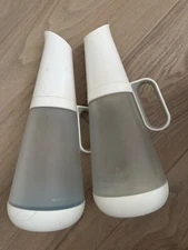 Grove Collaborative Refillable Cleaning Bottles With White Silicone Base