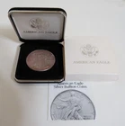 1996 American Eagle Silver uncirculated Dollar in display box with papers
