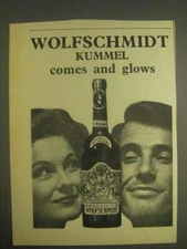 1959 Wolfschmidt Kummel Ad - Comes and Glows