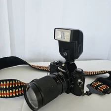 Nikon EM 35mm Film  Camera 62mm Lens and Flash, 28-85mm 