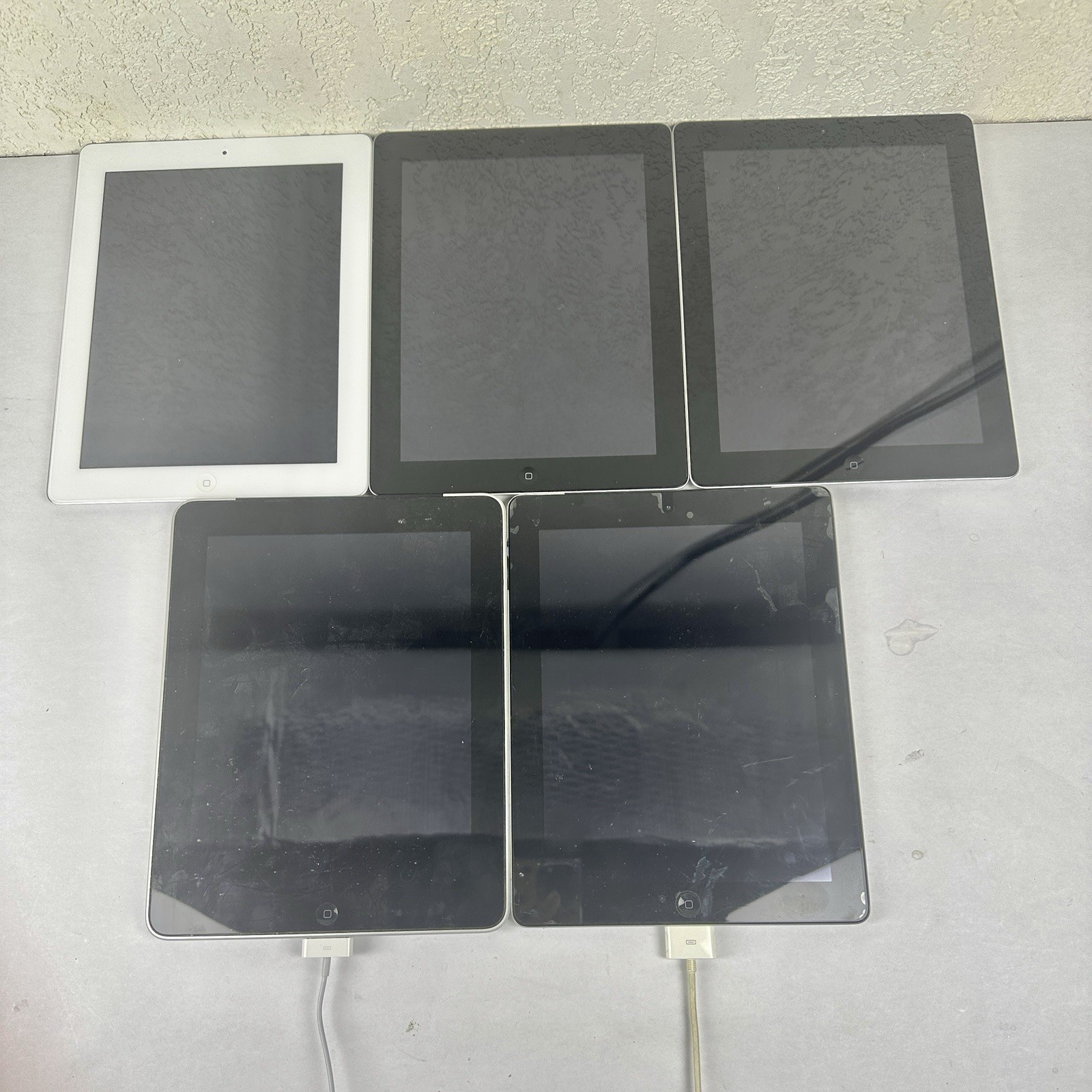 Lot of 5 iPads “As Is”  For Parts Screens Intact See Description For Models