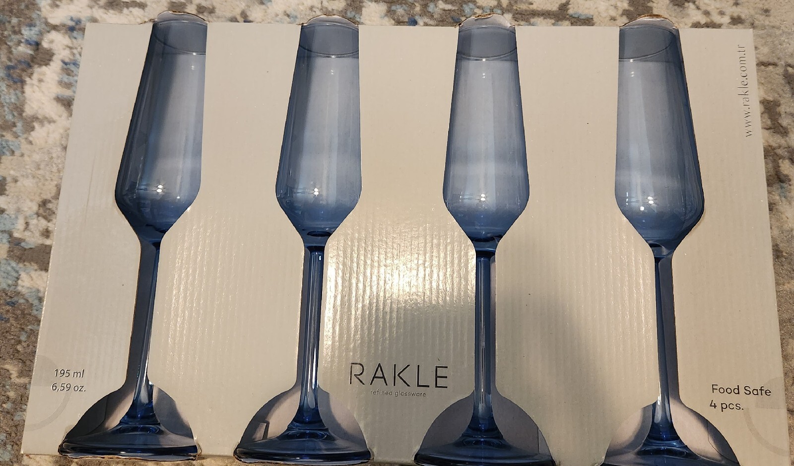 RAKLE REFINED GLASSWARE BLUE CHAMPAGNE FLUTES SET OF 4 NEW IN BOX