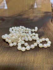 VINTAGE SET OF 16 6MM PEARLS AND LARGE 1/2 FI...