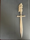vintage envelope opener with man playing bagpipes. — photo 1