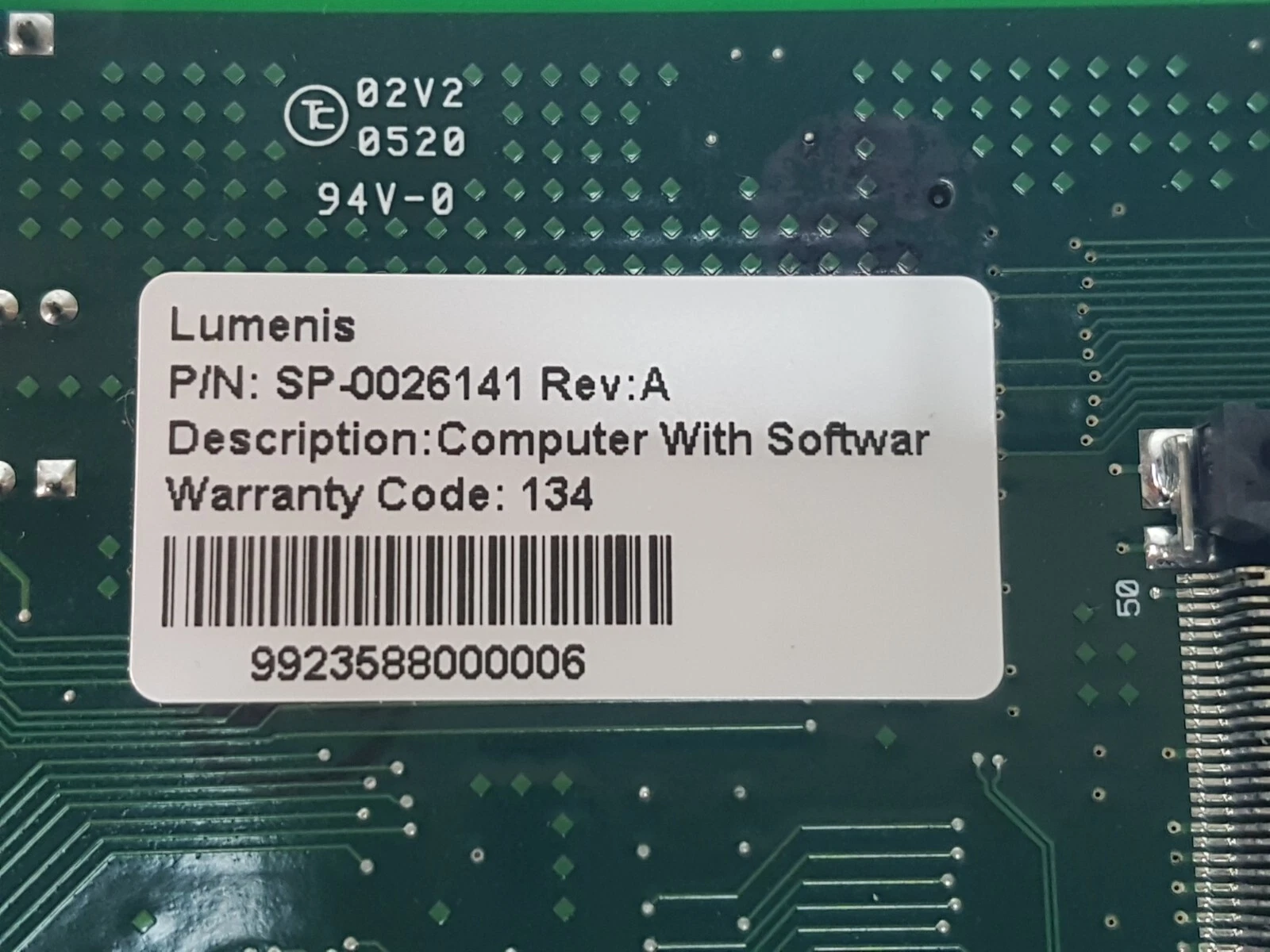 Lumenis SP-0026141 Rev A label on the underside of the second unit