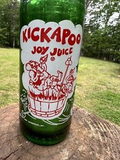 Bot de colección Kickapoo Joy Juice 10 oz "La receta original del parche para perros" 1965 NuGrape