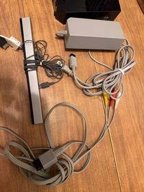 Nintendo Wii video game system console w/ sensor bar, stand, controllers, cables