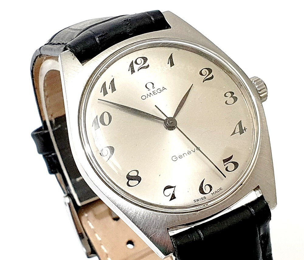 Omega Geneve 601 Handaufzug Herren Armbanduhr mit original