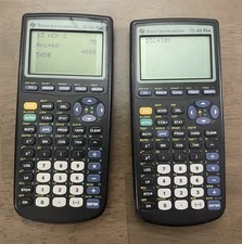 Lot of 2 Texas Instruments TI-83 Plus Graphing Calculators. Tested Works