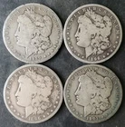 1889, 1896 O, 1896 O, and 1901 $1 Morgan Silver Dollars