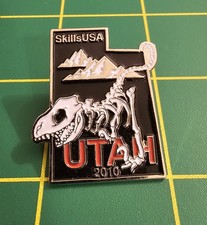 2010 Skillsusa Utah Dinosaur Skelton Enameled Souvenir Lapel Pin
