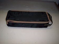 BLACK WITH BROWN ZIPPERED STORAGE CASE FOR CASSETTE TAPES  HOLDS 15 TAPES  34