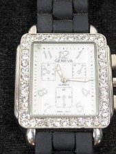 Geneva Womans MOP Dial Crystal Accent Silver Tone Case Black Silicone Band Watch