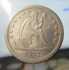 1857 SEATED LIBERTY US SILVER QUARTER COIN, ABOUT UNC.