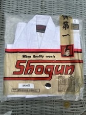 Shogun Bronze Karate Gi. Size 110cm. White 100% Cotton. With white belt.