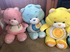 Care Bears Plush lot with VHS/DVDs
