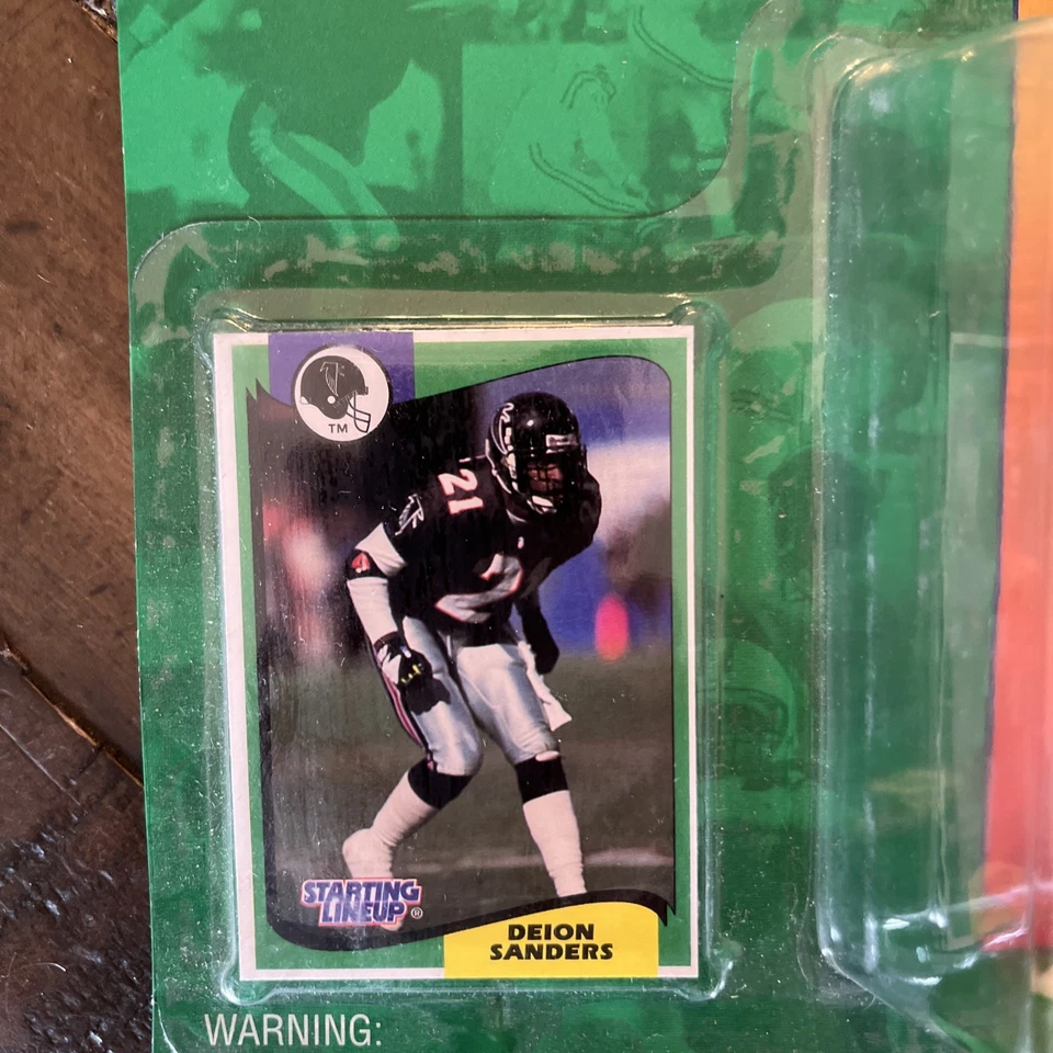 Figura Deion Sanders Atlanta Falcons 1994 alineación inicial con tarjeta y casco Foto 2 de 4