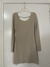 Beige sparkly long sleeve dress with open back. Size XS
