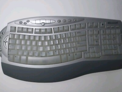 MICROSOFT  WIRELESS COMFORT KEYBOARD 1045, BATTERY POWERED, ERGONOMIC DESIGN