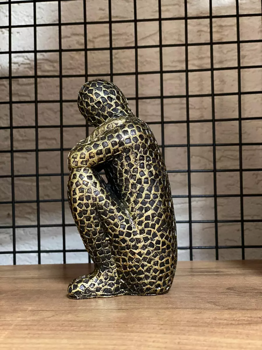 Sad statue deals