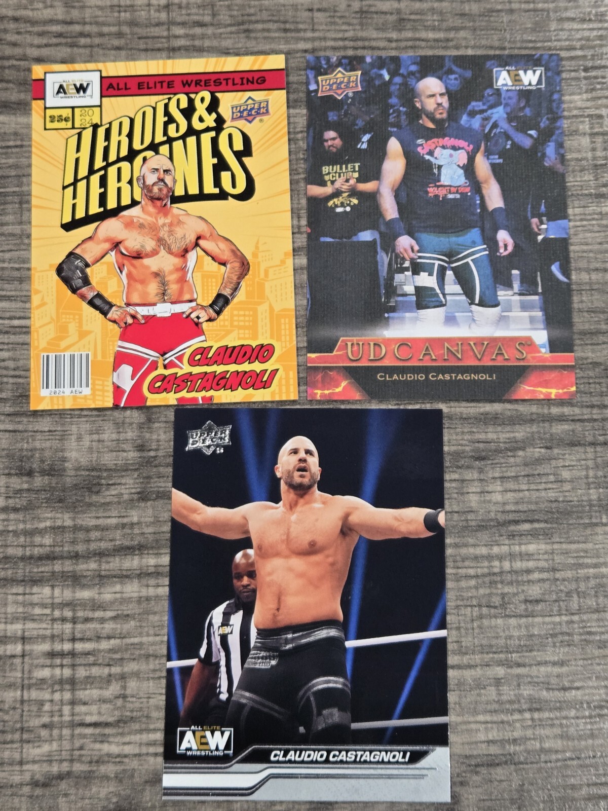 2024 Upper Deck AEW UD Canvas #C15 Claudio Castagnoli & Heroes & Heroines Gold