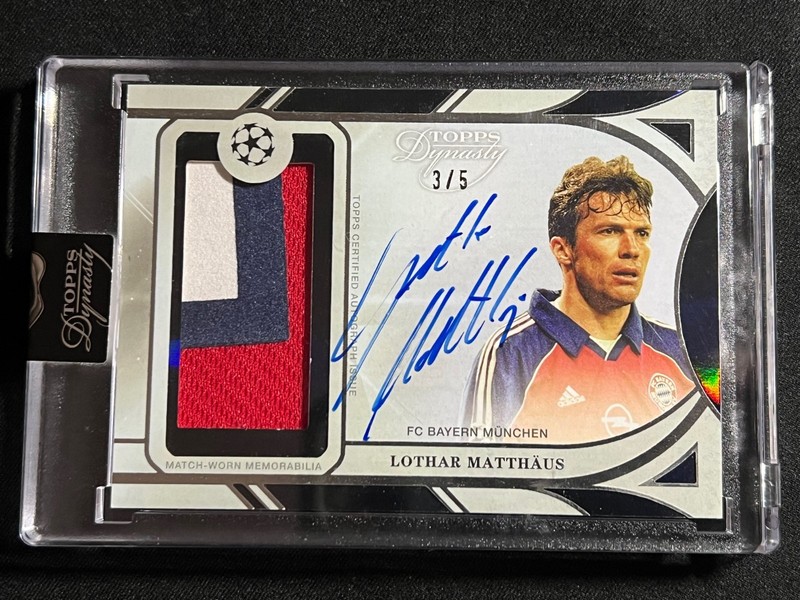 LOTHAR MATTHAUS 2024-25 TOPPS DYNASTY UCC MATCH-WORN PATCH AUTO BLACK /5 APL-MA1