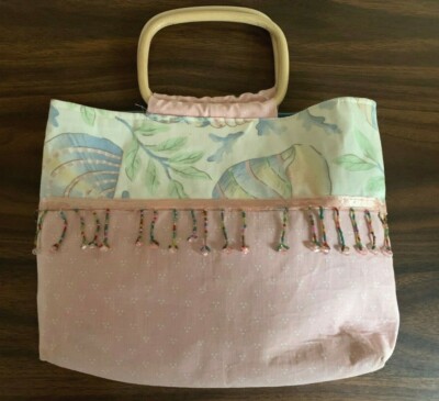 PURSE PINK WITH BEADING ON LOWER HALF & SUMMERY SHELL PATTERN  ON TOP HALF 