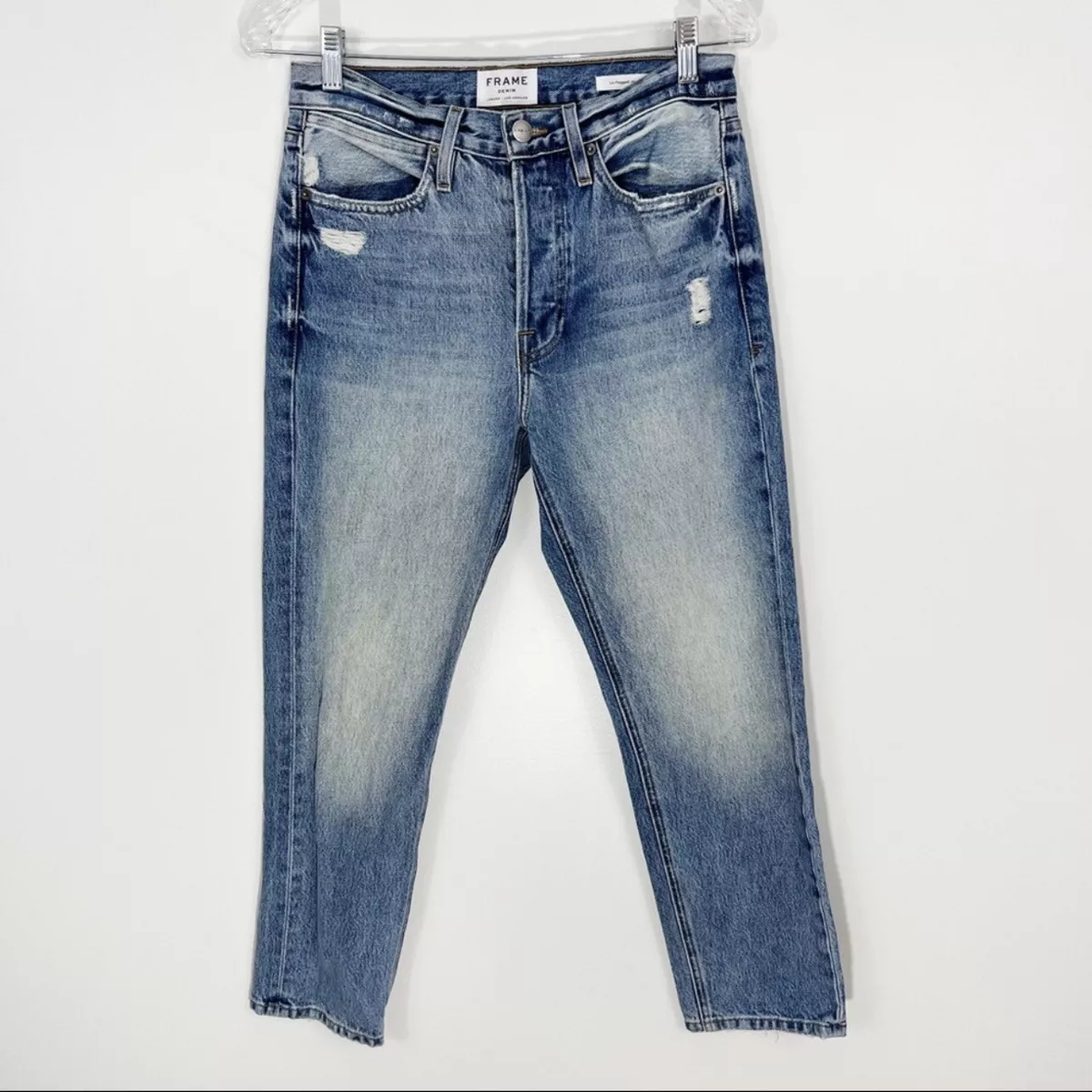 Frame le store pegged