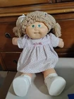 1982 CABBAGE PATCH DOLL WITH EXTRA CLOTHES