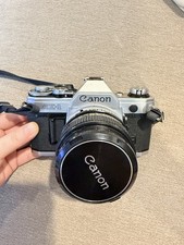 Canon AE-1 Silver 35mm SLR Film Camera w/ Canon FD 50mm f/1.4 S.S.C. Lens