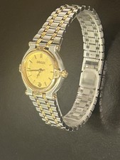 Gucci 6 1/2  model 9000l ladies lovely gold watch, new battery 299.99