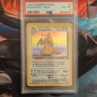 1999 POKEMON FOSSIL #4 DRAGONITE-HOLO PSA 6