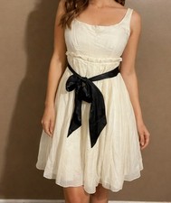 Vintage “Guess” Cream Colored DressWith Black Satin Belt Sleeveless,lined Size 9