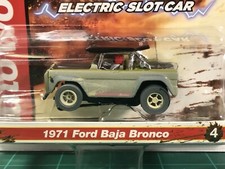 Auto World XTraction "Off Road" '71Ford Baja Bronco Olive Green HO Slot Car MIP
