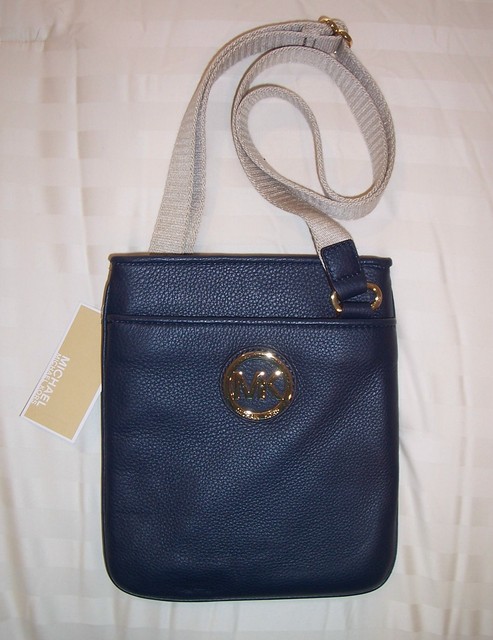 michael michael kors fulton small logo debossed leather canteen crossbody bolsa