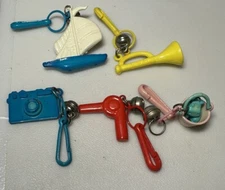 Vintage 1980s Lot Of 5 Bell Charms Plastic Clip On Blow Dryer Sailboat Camera