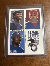 2000 Fleer Tradition Ken Griffey Jr, Rafael Palmeiro, Carlos Delgado #1