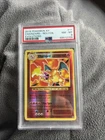2016 Pokemon XY Charizard REV-FOIL Evolutions PSA 8