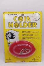 Red antique QUIKOIN VINTAGE COIN HOLDER WITH KEYCHAIN Copyright 1967