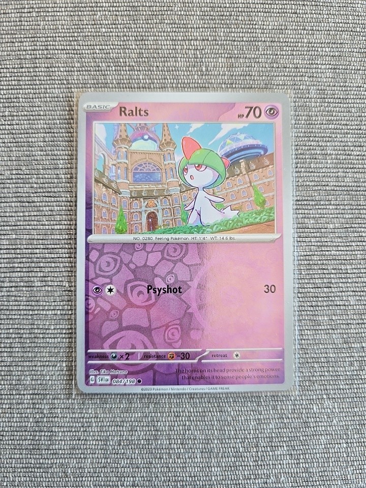 Ralts - 84/198 - Reverse Holo - Common - Paldean Fates - Pokemon Card - NM