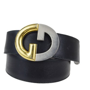 gold and silver gucci belt